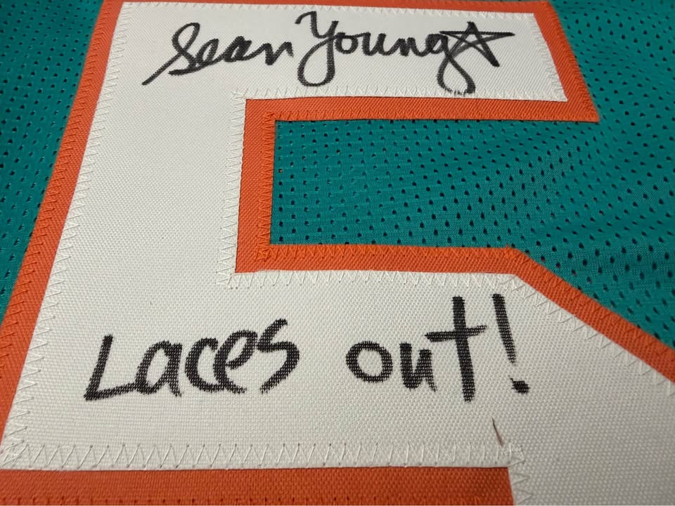 🎬🏈 Autographed “Ray Finkle” Miami Dolphins #5 Jersey – Signed by Sean Young – JSA- Ace Ventura