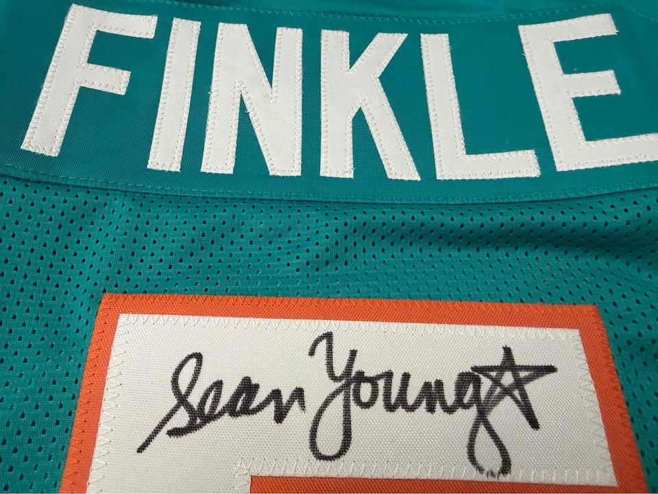 🎬🏈 Autographed “Ray Finkle” Miami Dolphins #5 Jersey – Signed by Sean Young – JSA- Ace Ventura