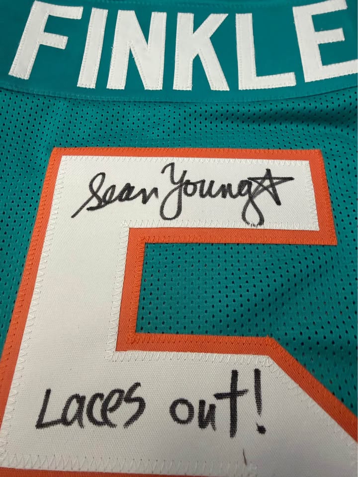 🎬🏈 Autographed “Ray Finkle” Miami Dolphins #5 Jersey – Signed by Sean Young – JSA- Ace Ventura
